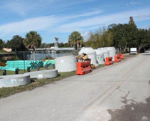 Construction materials are stored on River Boulevard.