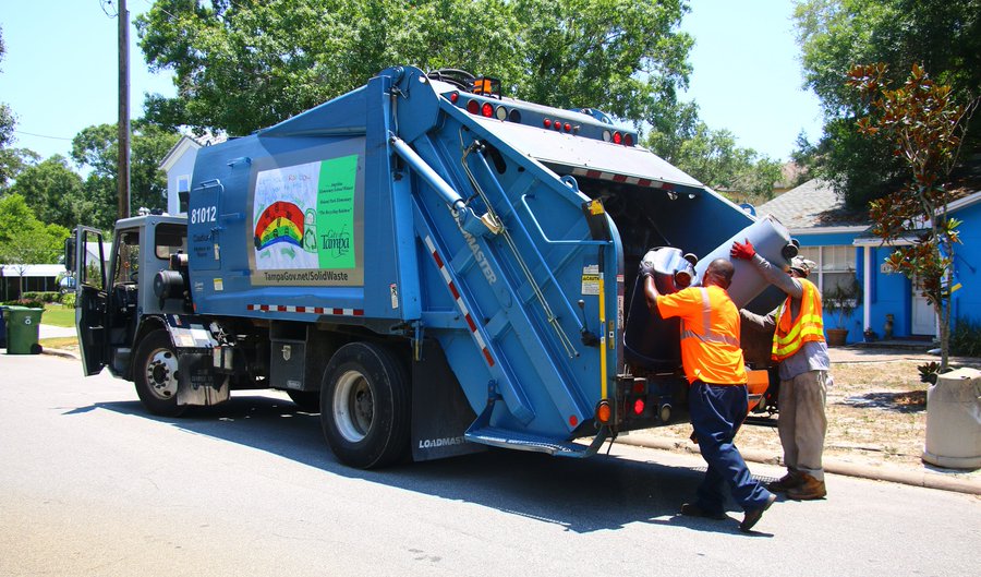 Cityy of Tampa solid waste employees collect trash
